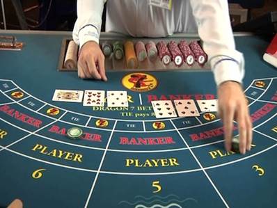http://www.casino8e.com/education/images/baccarat_dealer.jpg