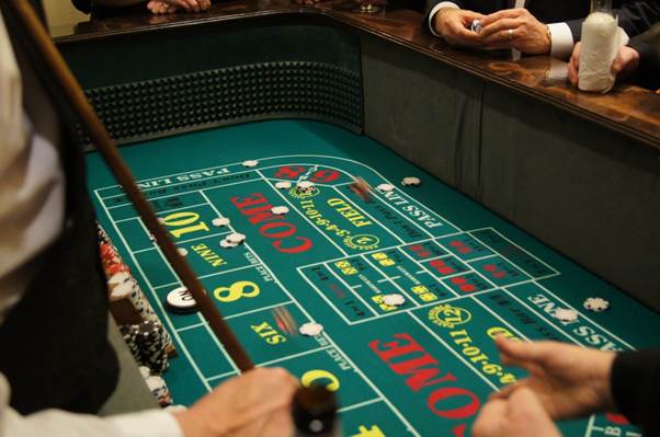 http://jacksandacesevents.com/wp-content/uploads/2012/04/casino-night-craps-table-closeup.jpg
